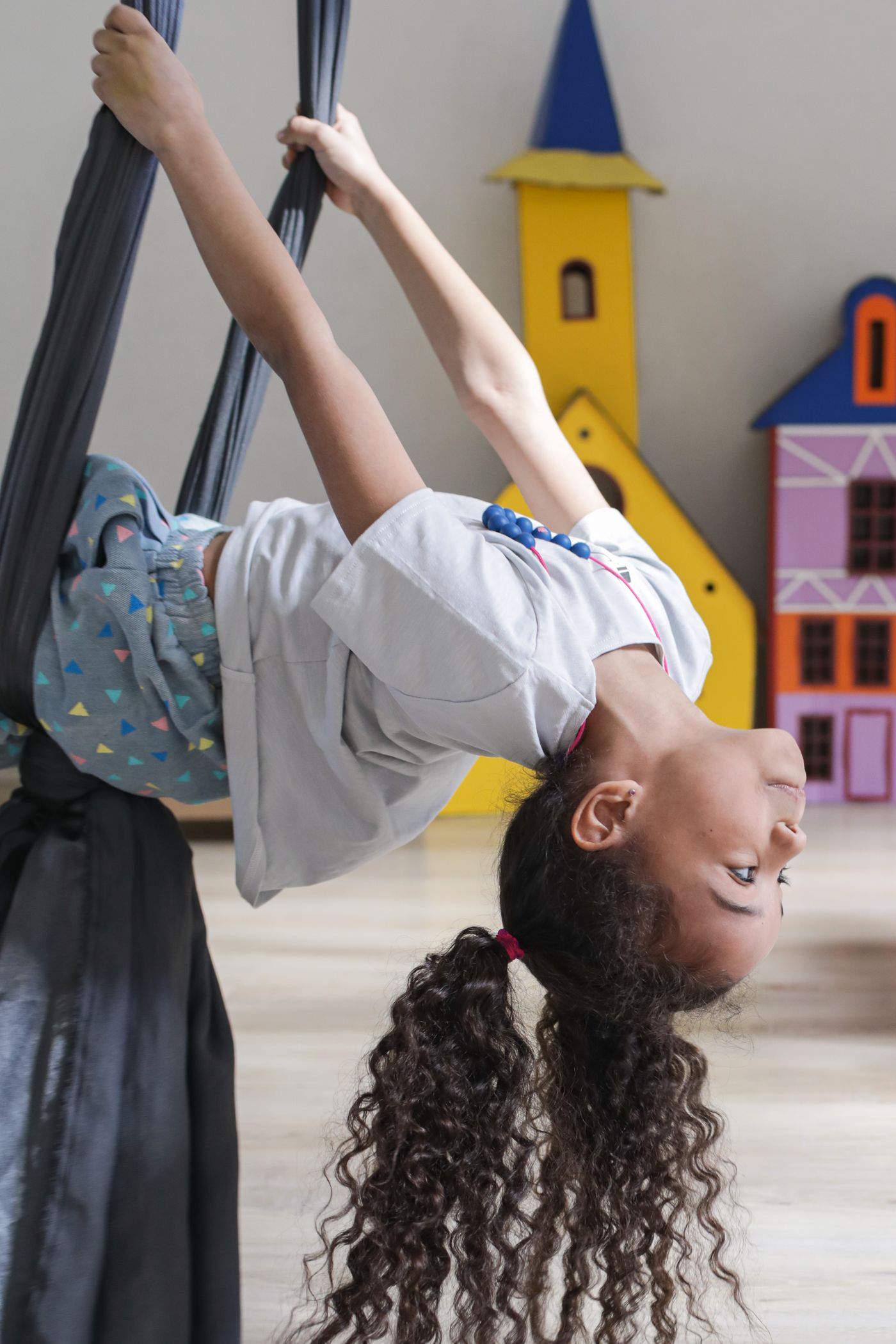 A child joyfully engaged in play-based learning